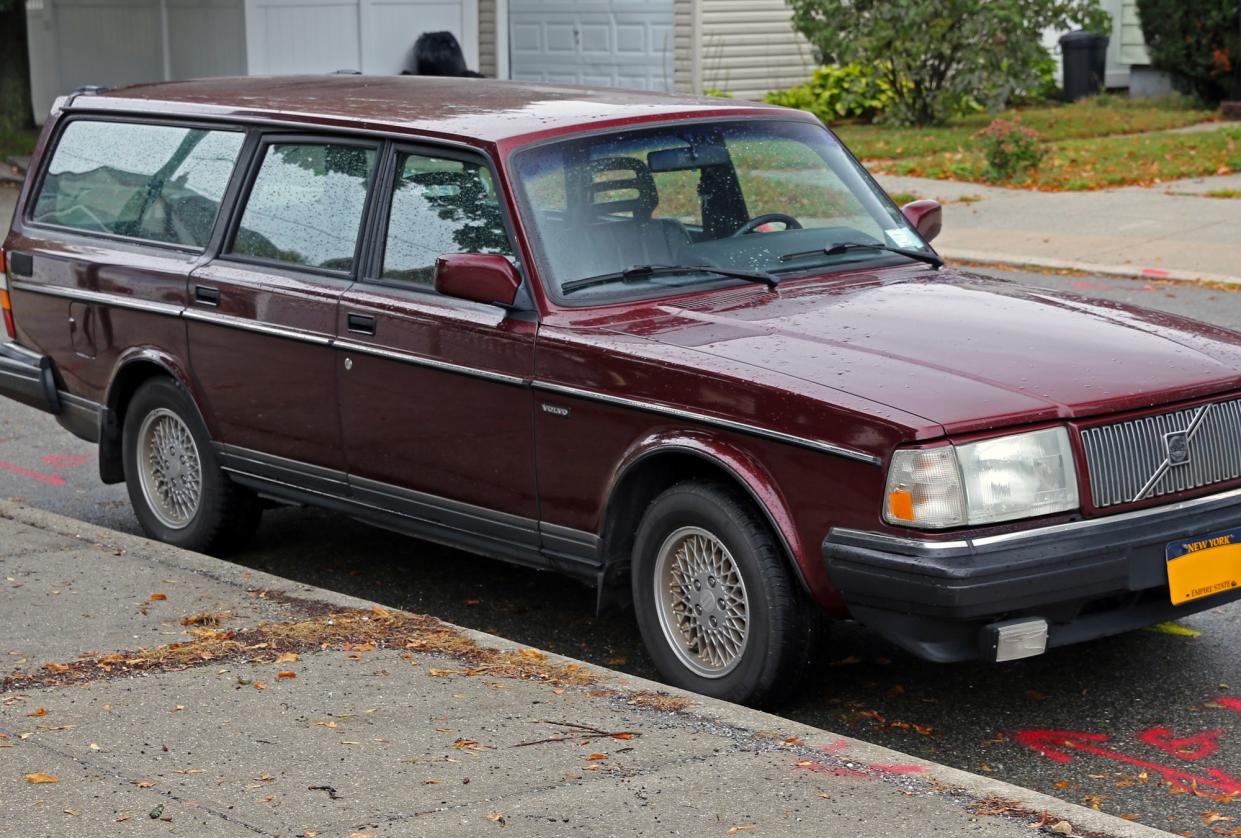 A 1993 Volvo 240 Classic Wagon. This (Ruby Red) was one of two colors, they were also available in Metallic Dark Teal Green. 