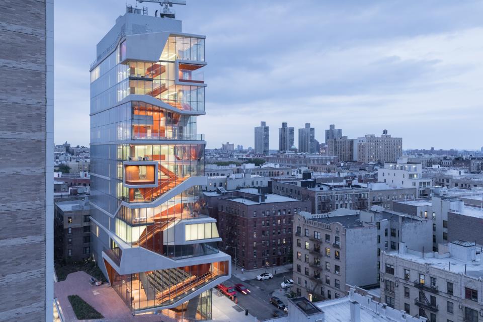 Columbia University’s Roy and Diana Vagelos Education Center, completed in 2016, achieves a “continuous surface building” in which a single concrete ribbon serves as walls, ceilings, and floors.