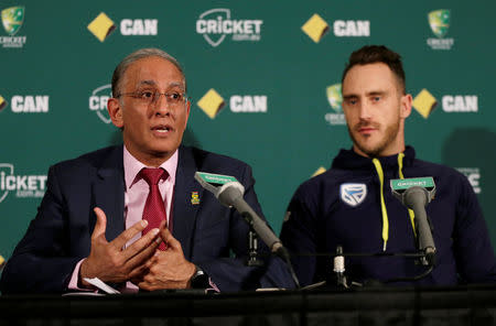 Third Test cricket match - Adelaide Oval, Adelaide, Australia - 23/11/16. South Africa's cricket captain Faf du Plessis (R) listens to Cricket South Africa Chief Executive Haroon Lorgat during a news conference before the third cricket test against Australia in Adelaide. REUTERS/Jason Reed