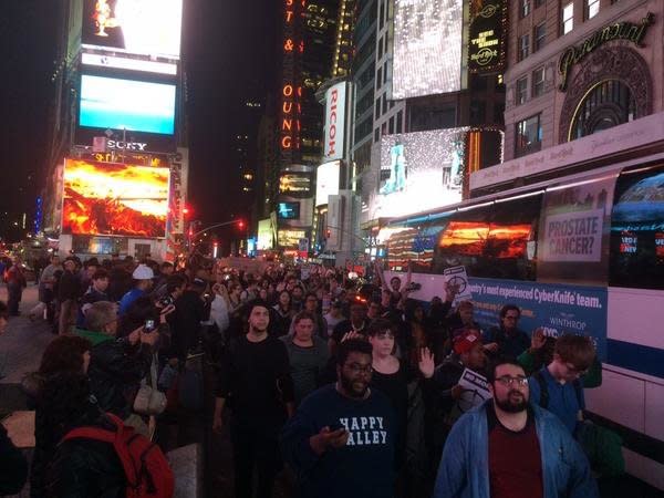 In this photo from Twitter user michaeljtabb, people protest in New York City. on Mon. Nov, 24, 2014. 