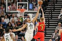 Feb 1, 2019; Salt Lake City, UT, USA; Utah Jazz center Rudy Gobert (27) blocks the shot of Atlanta Hawks guard Kevin Huerter (3) during the third quarter at Vivint Smart Home Arena. Utah Jazz won 128-112. Mandatory Credit: Chris Nicoll-USA TODAY Sports