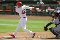 St. Louis Cardinals' Dylan Carlson hits a two-run single during the second inning of a baseball game against the Cleveland Indians Sunday, Aug. 30, 2020, in St. Louis. (AP Photo/Scott Kane)