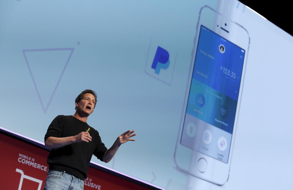 Dan Schulman, CEO of PayPal, delivers a keynote speech during the Mobile World Congress in Barcelona, Spain February 22, 2016. REUTERS/Albert Gea