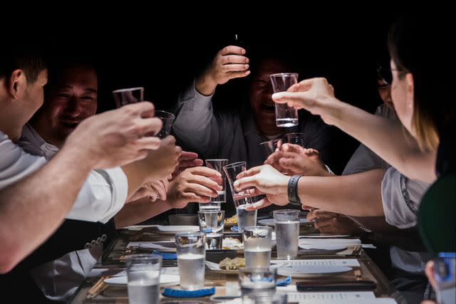 <p>Hecho/Courtesy of Sake Central</p> Toasting a reopened Hong Kong at Sake Central.