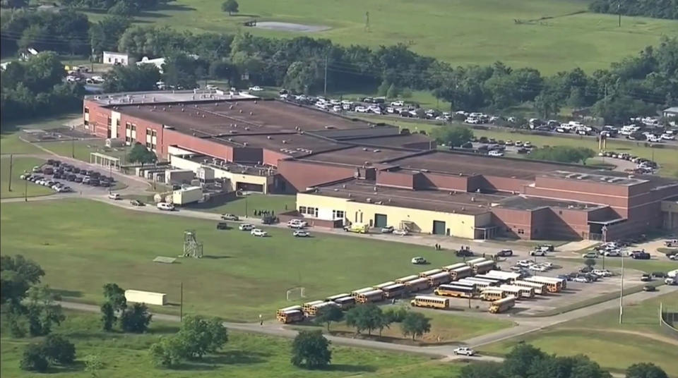 This image taken from video shows the campus of Santa Fe High School, Friday, May 18, 2018, in Santa Fe, Texas. Law enforcement officers responded to the school near Houston after an active shooter was reported on campus. The Santa Fe school district issued an alert Friday morning saying the high school has been placed on lockdown. (KTRK-TV ABC13 via AP)