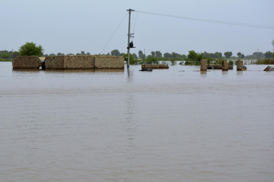 Houses are submerged in floodwater in Pakpattan district of Pakistan's Punjab province, Wednesday, Aug. 23, 2023. Rescuers have evacuated more than 100,000 people from flood-hit areas of Pakistan's eastern Punjab province in the past three weeks, officials said Wednesday. (AP Photo)