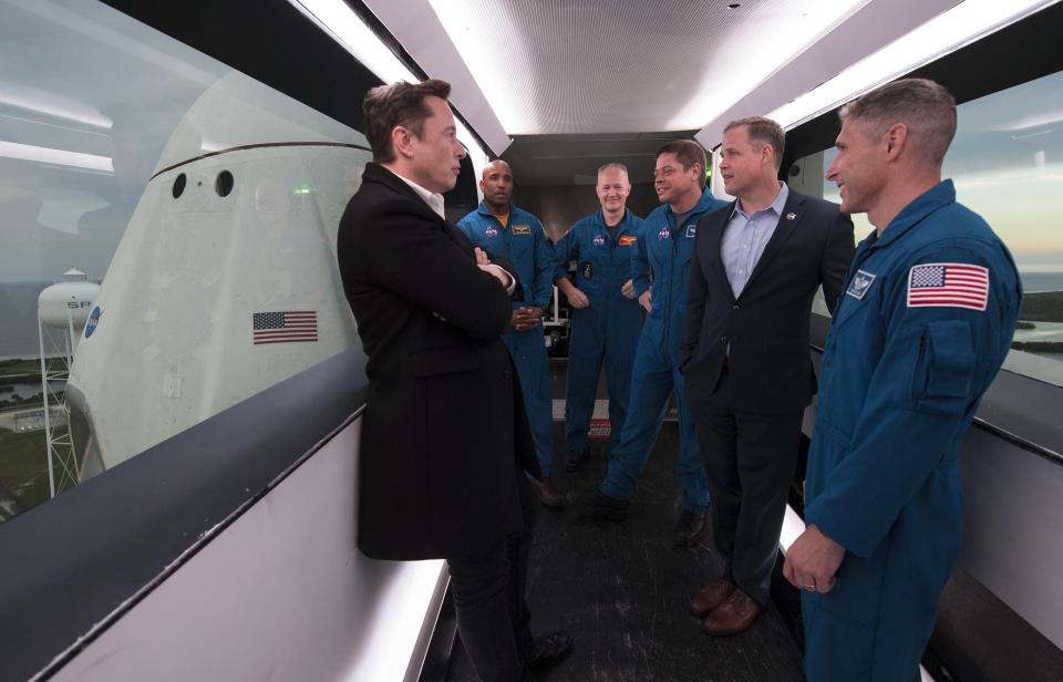 spacex elon musk nasa astronauts crew dragon doug hurley bob behnken commercial crew