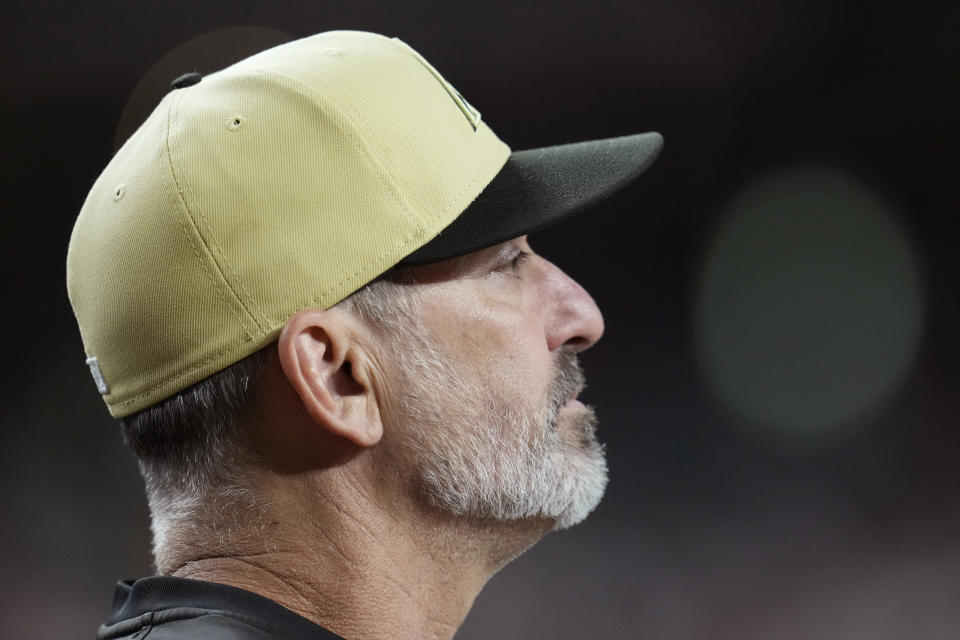 Arizona Diamondbacks manager Torey Lovullo watches the action on the field during the first inning of a baseball game against the San Francisco Giants, Tuesday, Sept. 24, 2024, in Phoenix. (AP Photo/Ross D. Franklin)