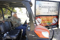 Lee Harrington sits in a utility vehicle on his farm, Wednesday, Sept. 20, 2023, in Ventucopa, Calif. Harrington is one of the small farmers, cattle ranchers and others living near the tiny town of New Cuyama whose water supplies and livelihoods are at the heart of a groundwater rights lawsuit brought by two of the nation's biggest carrot farming companies. (AP Photo/Marcio Jose Sanchez)