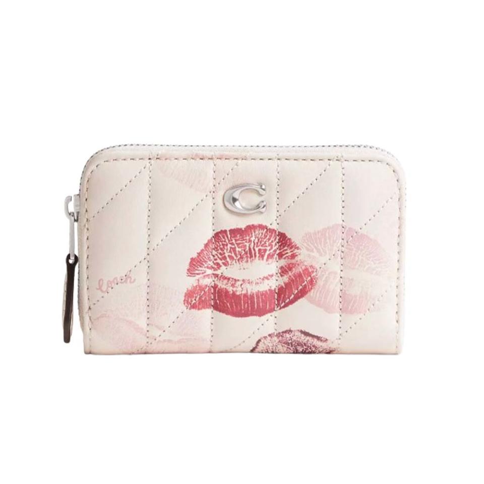 kiss-covered Coach wallet