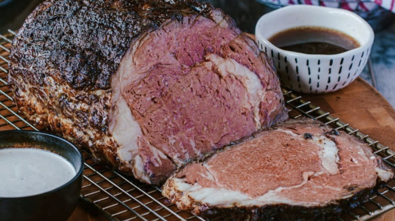 Sliced steak with dipping sauces