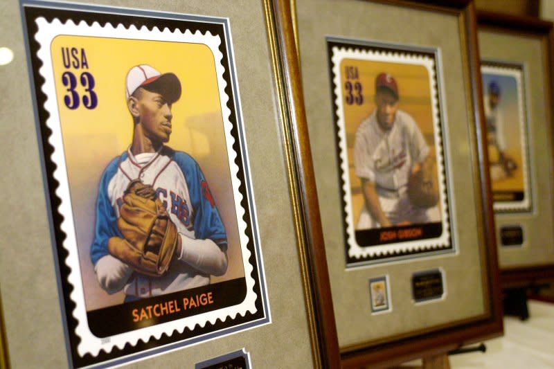 Stamps were donated to the Negro League Hall of Fame from U.S. Postal Rate Commisioner Danny Convington to honor the Legends of the Negro Leagues in New Carrollton, Md., on August 10, 2004. On July 1, 1847, the first U.S. postage stamps were issued. File Photo by Arianne Starnes/UPI