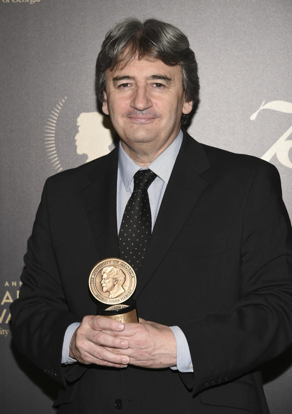 The BBC's Fergal Keane poses with his award at the 75th Annual Peabody Awards Ceremony at Cipriani Wall Street on Saturday, May 21, 2016, in New York. (Photo by Evan Agostini/Invision/AP)