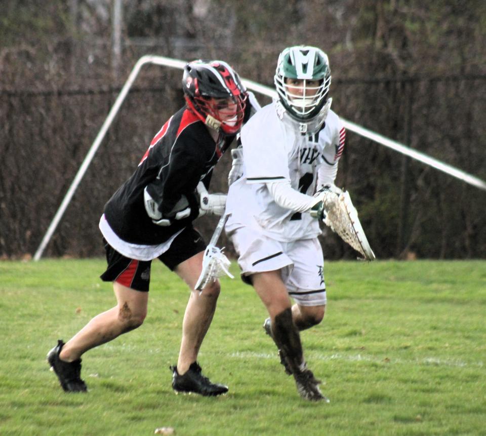 Dover goalie Dom Chalifour is on the move during Wednesday's game against Bedford that included his 700th career save and a new state record.