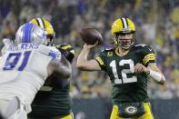 Green Bay Packers' Aaron Rodgers throws during the second half of an NFL football game against the Detroit Lions Monday, Sept. 20, 2021, in Green Bay, Wis. (AP Photo/Mike Roemer)