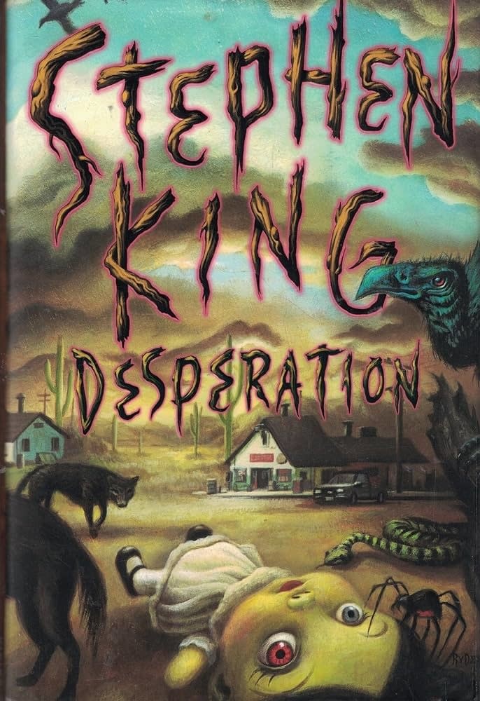 Cover of Stephen King's "Desperation" featuring eerie figures and a desolate small town backdrop