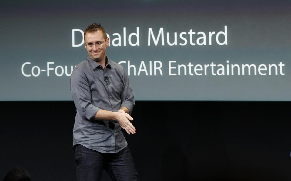 Epic Games' Donald Mustard, co-founder of ChAIR entertainment speaks during Apple Inc's media event in Cupertino