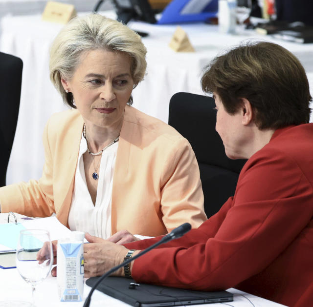 European Commission President Ursula von der Leyen, left, greets Managing Director of the IMF Kristalina Georgieva during an outreach session of the leaders of the G7 nations and invited countries, during the G7 Summit in Hiroshima, western Japan, Saturday, May 20, 2023. (Japan Pool via AP)
