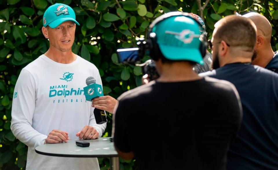 Miami Dolphins Outside Linebackers Coach Ryan Slowik speaks with reporters before the start of team practice at the Baptist Health Training Complex on Friday, Aug. 4, 2023 in Miami Gardens, Fla.
