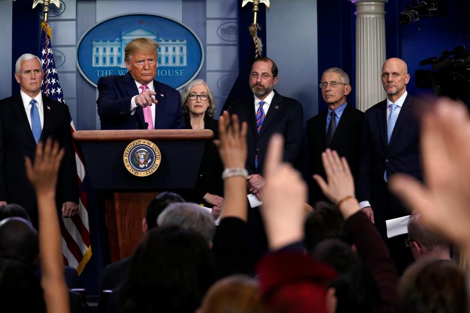 President Donald Trump, with members of the president's coronavirus task force, speaks during a news conference in the Brady Press Briefing Room of the White House, Wednesday, Feb. 26, 2020, in Washington.