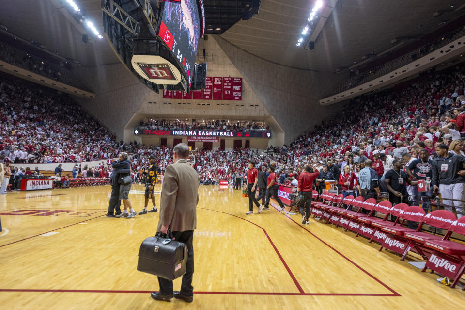 More than 17,000 fans filed out of Assembly Hall midway through the second half of Tuesday's game.(AP Photo/Doug McSchooler)