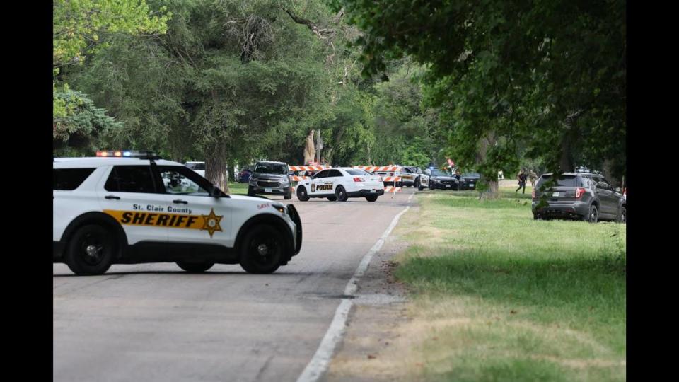 Law enforcement officers, including a SWAT team, in Cahokia Heights, Illinois on June 18, 2024. Police say that earlier, a Lake Drive man fired at officers who were following up on a complaint about his dogs.