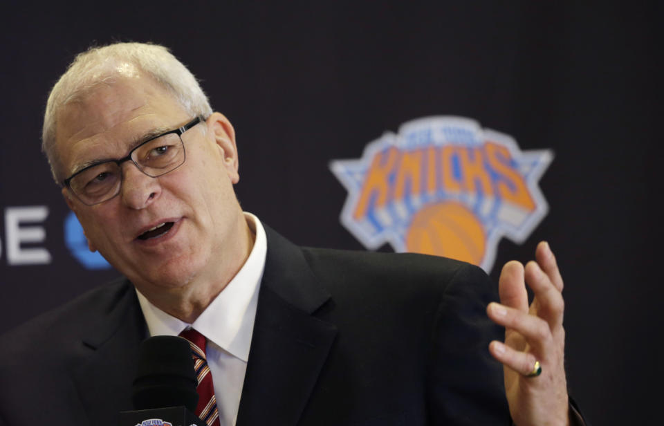 Phil Jackson, the new president of the New York Knicks, answers questions during a news conference, Tuesday, March 18, 2014 in New York. Jackson, who won two NBA titles as a player with the Knicks, also won 11 championships while coaching the Chicago Bulls and the Los Angeles Lakers. (AP Photo/Mark Lennihan)