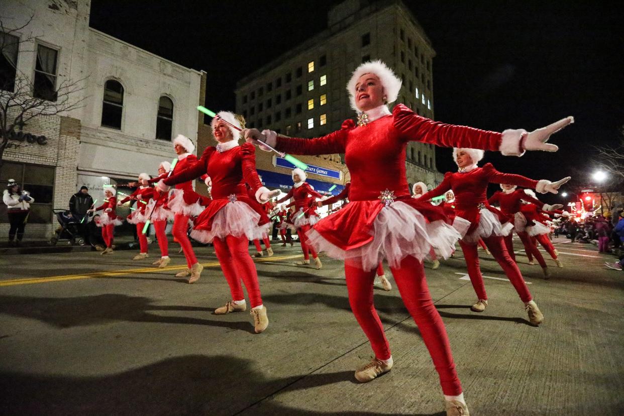 Dancers from the Touch of Silver dance school perform Nov. 18, 2021, in Oshkosh's holiday parade on Main Street. The parade will start at 6:15 p.m. Thursday.