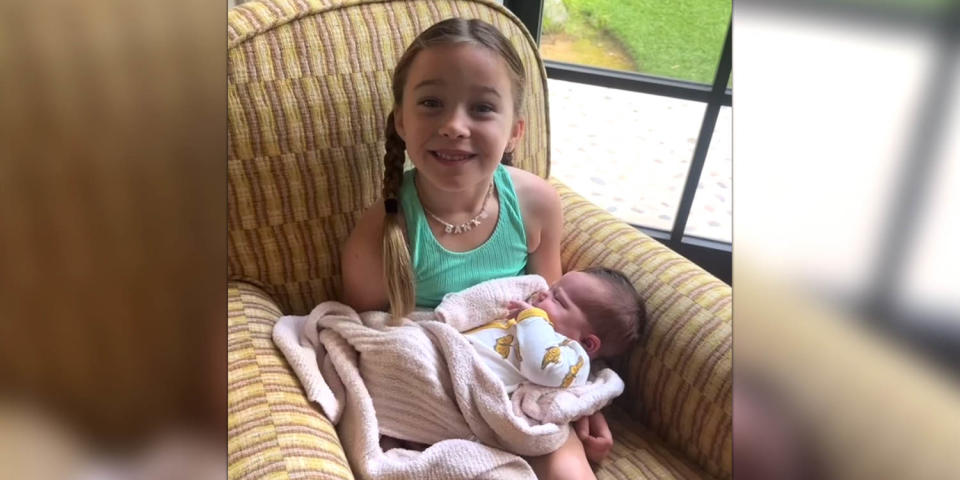 Hilary Duff's daughter, Banks, proudly holds her new baby sister! (Hilary Duff / Instagram)