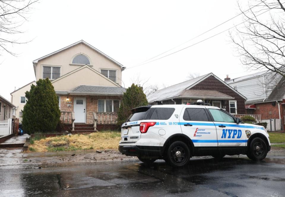 Police at a Queens home taken over by squatters. Homeowner Adele Andaloro was handcuffed when she tried to evict them. Brigitte Stelzer