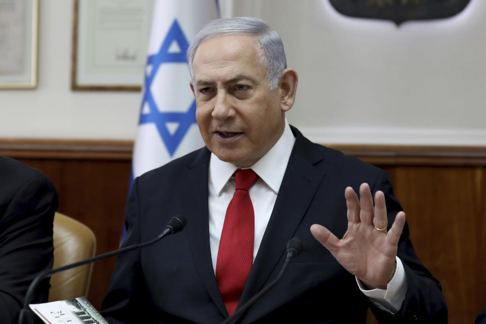 Israeli Prime Minister Benjamin Netanyahu chairs the weekly cabinet meeting at his office in Jerusalem, Sunday, Oct. 27, 2019. Israel's prime minister says he wants a "broad national unity government" amid political deadlock over forming a government following last month's elections. Speaking to his Cabinet, Benjamin Netanyahu said such a coalition is essential for Israel to face what he said were mounting security challenges around the region. (Gali Tibbon/Pool Photo via AP)