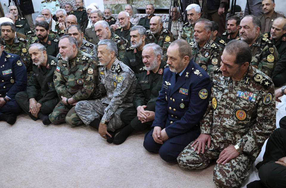 In this photo released by an official website of the office of the Iranian supreme leader, a group of senior military leaders, listen to Supreme Leader Ayatollah Ali Khamenei in their meeting in Tehran, Iran, Sunday, April 21, 2024. Iran's supreme leader on Sunday dismissed any discussion of whether Tehran's unprecedented drone-and-missile attack on Israel hit anything there, a tacit acknowledgment that despite launching a massive assault, few projectiles actually made through to their targets. (Office of the Iranian Supreme Leader via AP)