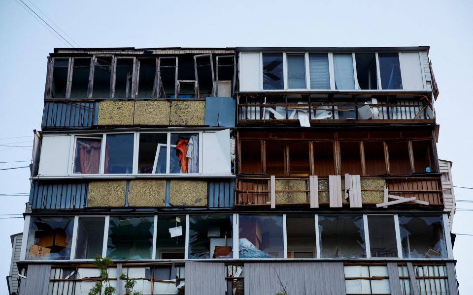 A view of a residential building damaged in a Russian missile strike on Kyiv - VALENTYN OGIRENKO/REUTERS