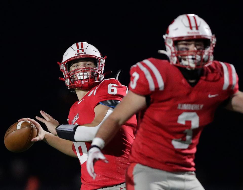 Kimberly's Braedon Ellefson (6) launches a pass against Neenah during their WIAA Division 1 state quarterfinal football game Friday in Kimberly.