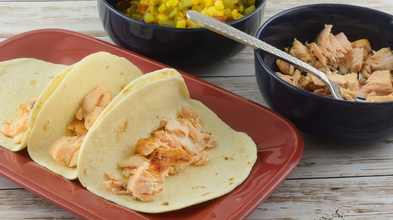 fish tacos being assembled