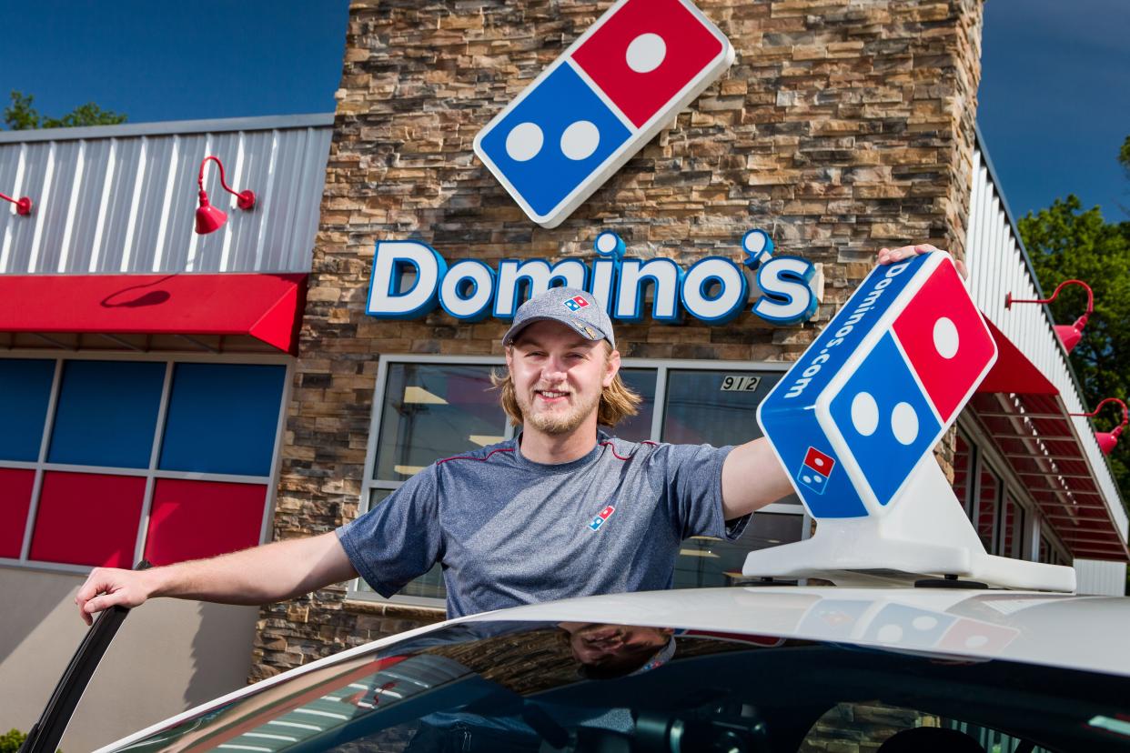 Domino's delivery driver and car