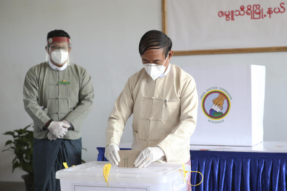 Myanmar's President Win Myint makes an early voting for upcoming Nov. 8 general election at Union Election Commission office, Thursday, Oct. 29, 2020, in Naypyitaw, Myanmar. (AP Photo/Aung Shine Oo)