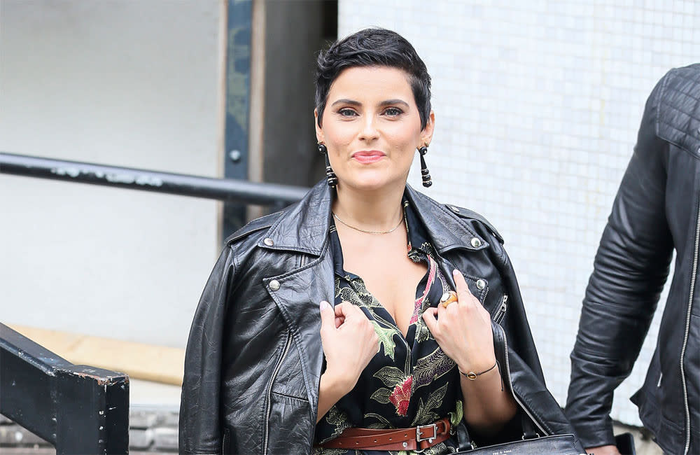 Nelly Furtado thinks young people experiment too much with their skin credit:Bang Showbiz