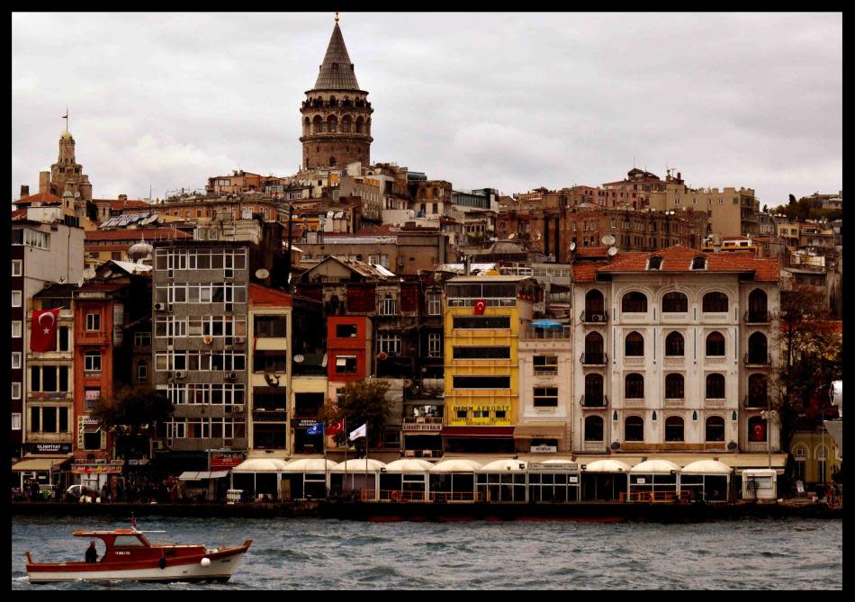The cone-topped Galata Tower dominates the skyline of old Istanbul.