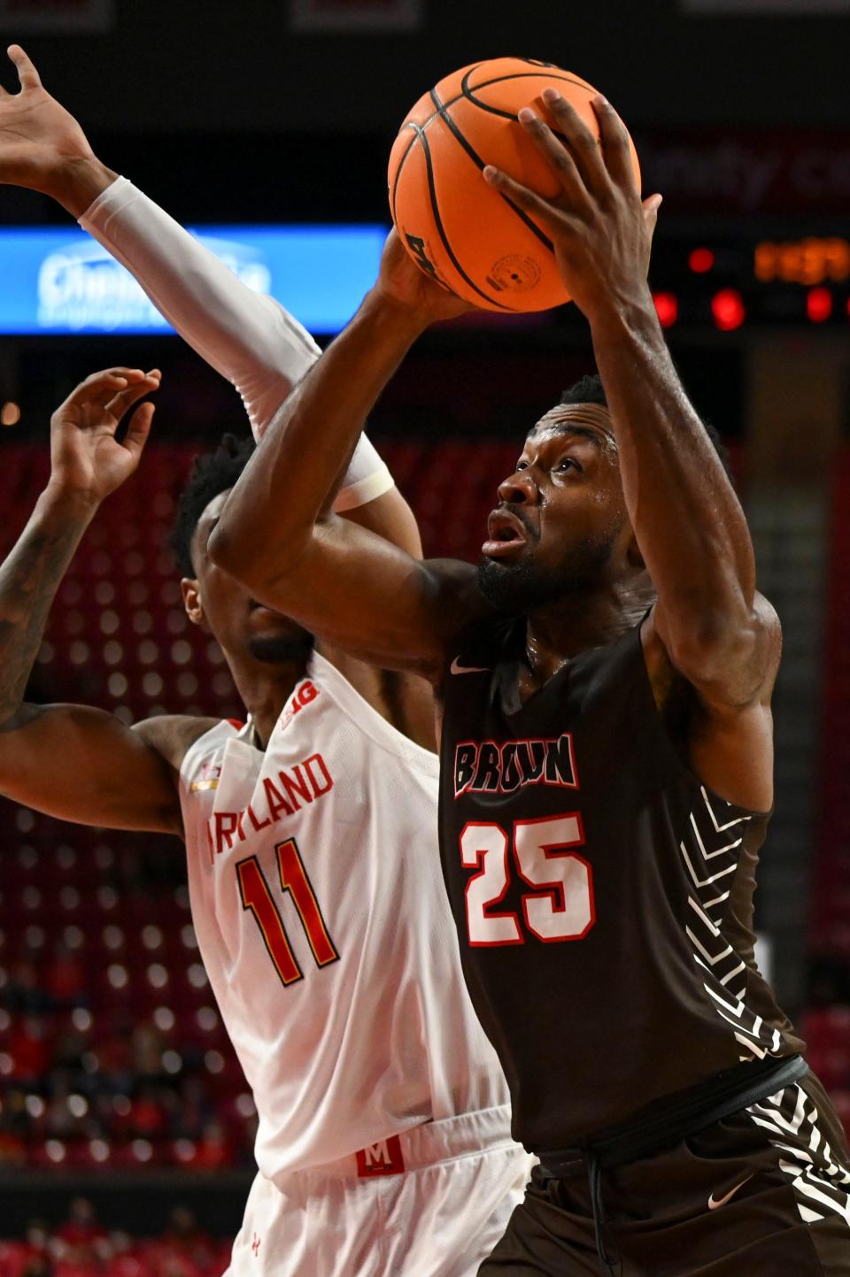 Tamenang Choh, right, shown in a December game at Maryland, was just 1-for-10 from the field Friday night against Harvard.