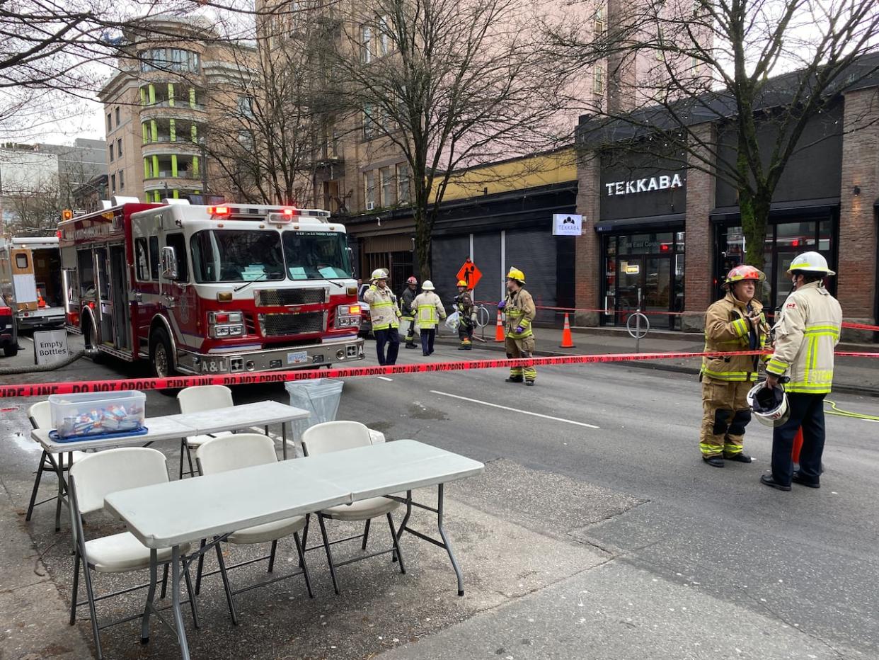 Crews attended a fire in an SRO building in Vancouver's Downtown Eastside Wednesday morning.  (Liam Britten/CBC - image credit)