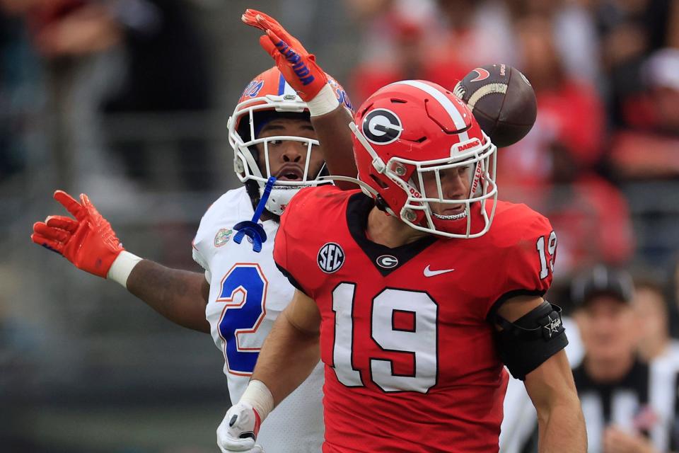 Georgia tight end Brock Bowlers (19), seen here before corralling a deflected ball off Florida linebacker Amari Burney (2) in last year's win over the Gators, has a chance to become only the third tight end in NFL history to be taken in the top-5 of the NFL draft.