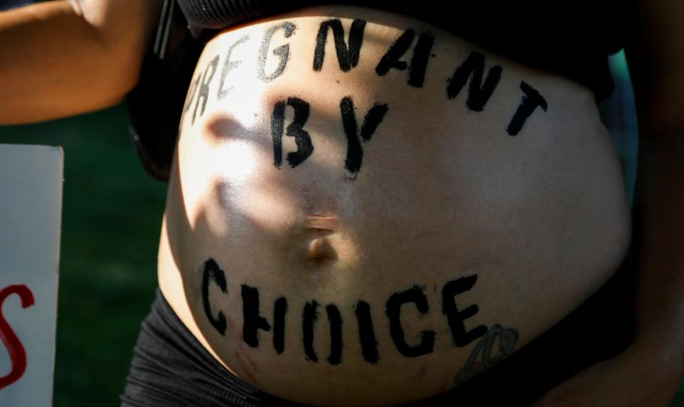 Abortion rights activists marched from the Park Central Square to the Federal Courthouse in Downtown Springfield on Friday, June 24, 2022 after the U.S. Supreme Court overturned Roe v. Wade. 