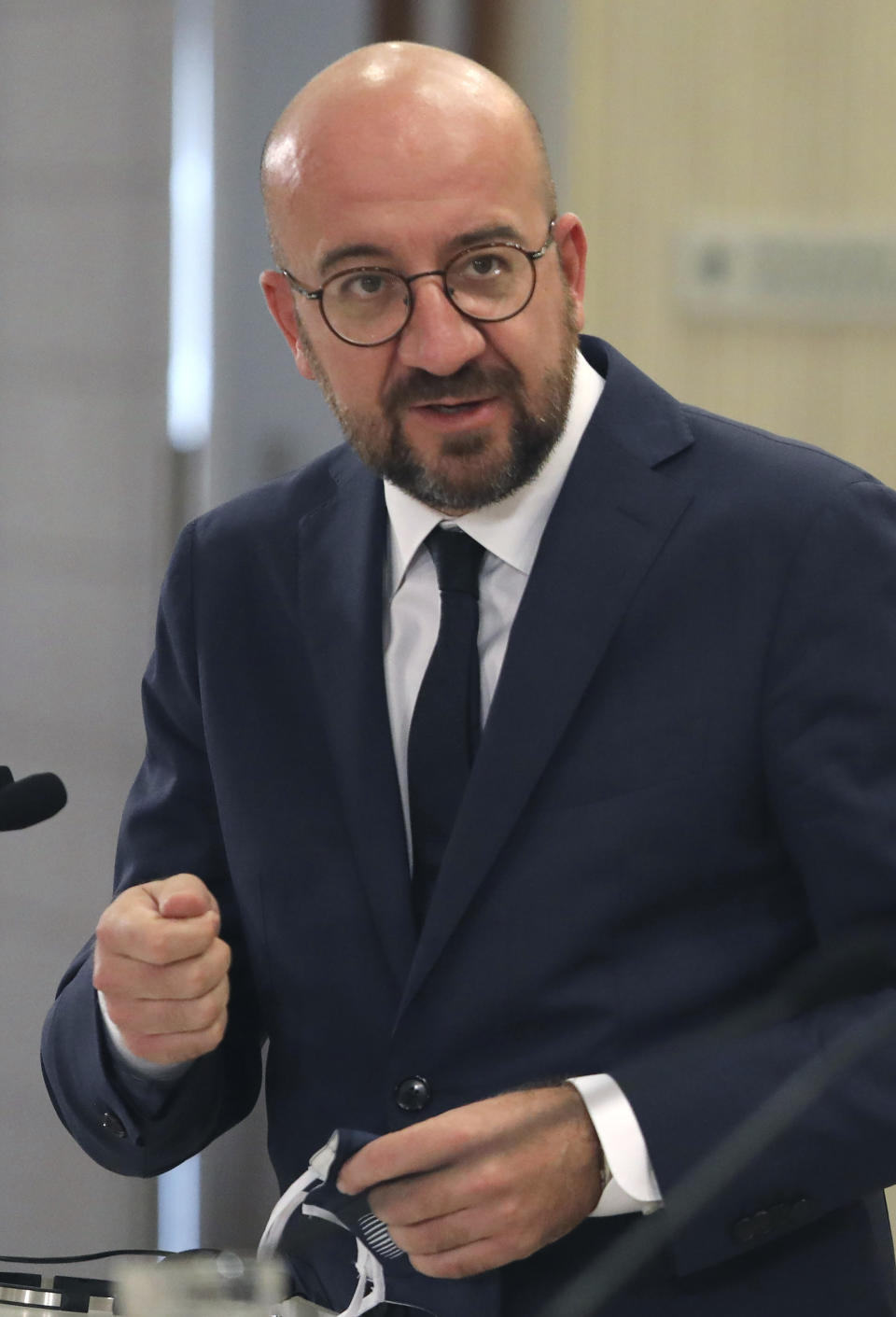 European Union Council President Charles Michel talks to the media during a press conference after a meeting with Cyprus President Nicos Anastasiades at the Presidential Palace in the capital Nicosia, Cyprus, Wednesday, Sept. 16, 2020. Michel is visiting Cyprus after traveling to Greece amid a diplomatic drive to de-escalate a weeks-long standoff at sea over Turkey's hydrocarbons search in waters were Greece and Cyprus claim exclusive economic rights. (Yiannis Kourtoglou, Pool via AP)