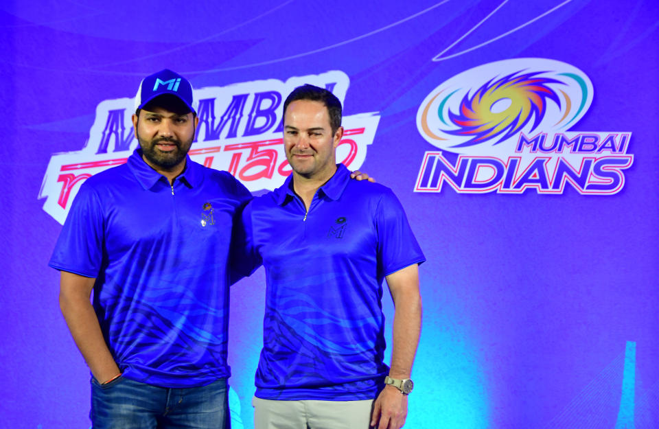 MUMBAI, INDIA - MARCH 29: Rohit Sharma, captain of Mumbai Indians and team's head coach Mark Boucher pose for the photos during a press conference ahead of IPL 2023, on March 29, 2023 in Mumbai, India. (Photo by Bhushan Koyande/Hindustan Times via Getty Images)