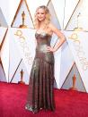 <p>Golden girl JLaw can do no wrong - and that includes her skintight metallic Dior that hugged every inch of her incredible figure.</p>