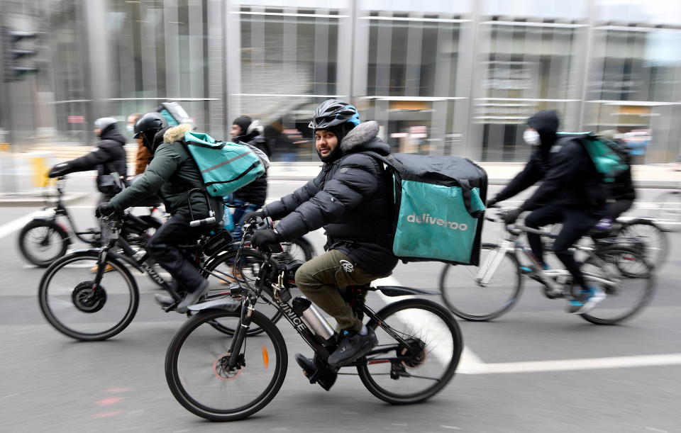 Deliveroo riders demonstrate to push for improved working conditions, in London, Britain, April 7, 2021. REUTERS/Toby Melville