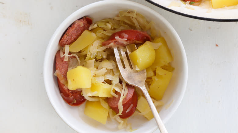 kielbasa and sauerkruat in a bowl