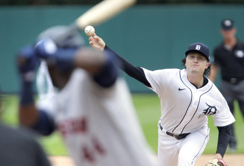 Detroit Tigers' Casey Mize pitches against Houston Astros' Yordan Alvarez during the third inning of the first baseball game of a doubleheader Saturday, June 26, 2021, in Detroit. (AP Photo/Duane Burleson)