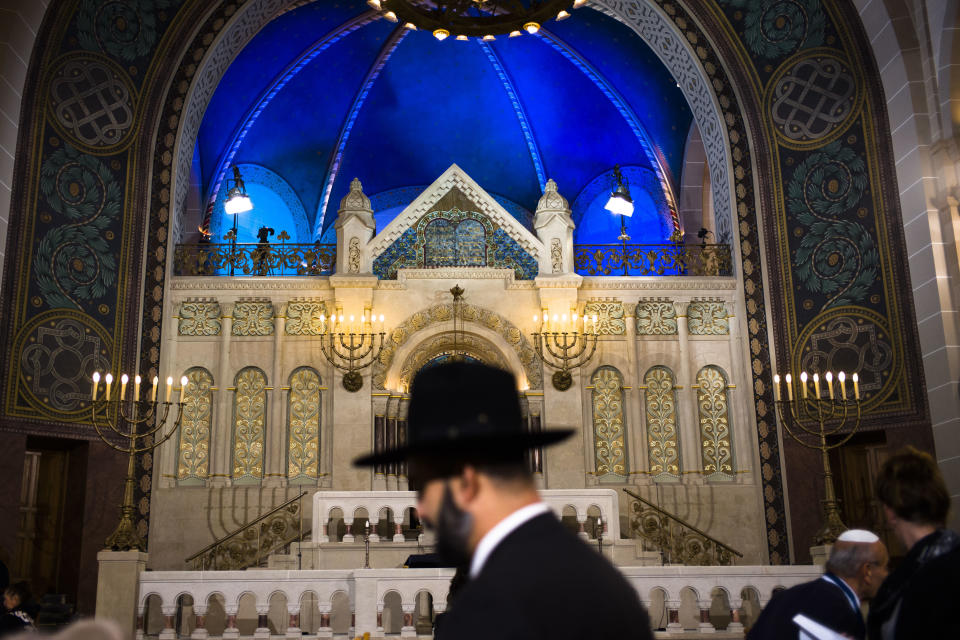 FILE - In this Friday, Nov. 9, 2018 file photo a rabbi arrives at the synagogue Rykestrasse in the district Prenzlauer Berg in Berlin, to attend an event commemorating the Night of Broken Glass 1938, in which Nazis burned and vandalized synagogues and Jewish businesses across the country and killing over 400 people. A new survey says about one in four Europeans hold anti-Semitic beliefs, with such attitudes on the rise in eastern countries and mostly steady in the west. (AP Photo/Markus Schreiber, file)